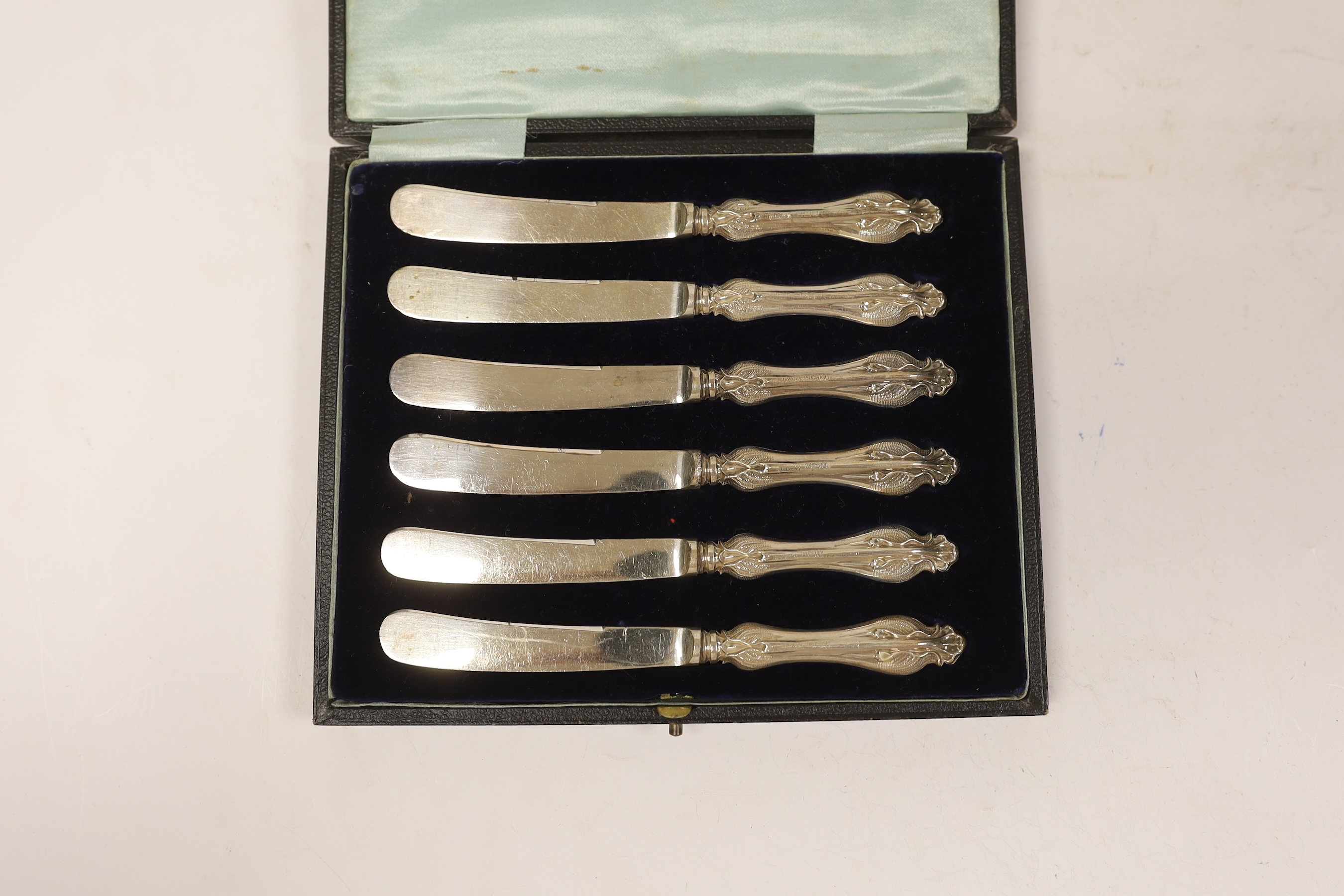 Four assorted cased cutlery sets including a set of twelve Norwegian gilt 925 and guilloche enamel coffee spoons.